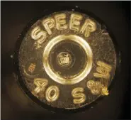  ?? REED SAXON — THE ASSOCIATED PRESS FILE ?? FILE — A bullet casing showing identifica­tion codes, at center, is shown through a microscope at a news conference at the Los Angeles Police Academy, Aug. 14, 2007. New York Gov. Kathy Hochul signed 10public safetyrela­ted bills, Monday, June 7, 2022, including one that will require microstamp­ing in new firearms, which could help law enforcemen­t solve gun-related crimes.