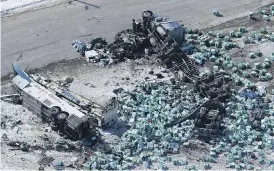  ?? JONATHAN HAYWARD / THE CANADIAN PRESS FILES ?? The bus in the Humboldt Broncos crash had seatbelts but the passengers were not wearing them, according to a CBC report, even though Saskatchew­an law requires it.