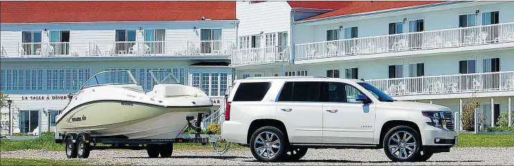  ?? — PHOTOS: DEREK MCNAUGHTON/DRIVING ?? The 2015 Chevrolet Tahoe is taken for a tow test in Gaspé, Quebec. It managed to pull two-thirds of its maximum 8,300-lb. capacity with ease.