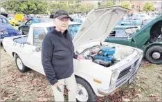  ?? ?? GOOD FUN: Beechworth’s Gayle Mortimer is proud to have restored her 1991 Datsun 1200 with the help of Old Cranks Motor Club member Keith Harmes that has only been owned by women originally owned by a female farmer then a hairdresse­r in town.