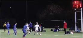  ?? MIKE BUSH/NEWS-SENTINEL ?? Members of the Lodi and Bear Creek boys' soccer teams played under the lights at Don Rostomily Field for the first time on Tuesday night.