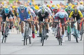  ?? FOTO: AP ?? Kittel empezó el sprint partiendo de la cuarta posición, a rueda de Boasson Hagen