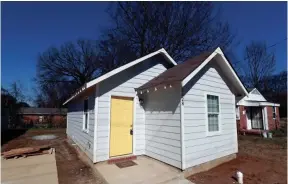  ??  ?? Jones has completed work on two tiny homes in the Orange Mound neighborho­od.