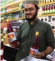  ?? ?? Bottles of Rooh Afza on sale at a market in Karachi, Pakistan