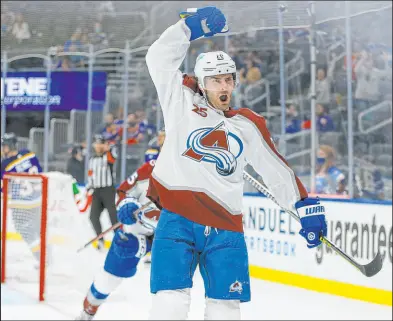  ?? Scott Kane The Associated Press ?? Avalanche left wing Brandon Saad celebrates after scoring a third-period goal Friday in Colorado’s 5-1 victory over the Blues at Enterprise Center. The Avs took a 3-0 series lead.