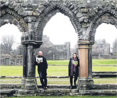  ?? Picture: Mhairi Edwards. ?? Poets Andy Fierens and Katie Hale in St Andrews Abbey.