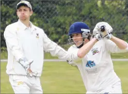  ?? Picture: Paul Amos FM4850538 ?? Ashford’s Jack Richardson looks for runs against Orpington during his innings of 35