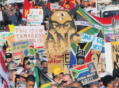  ?? Picture: Reuters ?? ‘GO NOW’. Anti-Zuma protesters, civil society groups and faith communitie­s march against President Jacob Zuma in Cape Town yesterday.