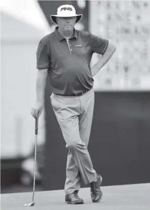  ?? Drew Hallowell, Getty Images ?? Kirk Triplett stands tall by matching the low round of a PGA Tour Champions major, with a 62 on Thursday at the U.S. Senior Open.