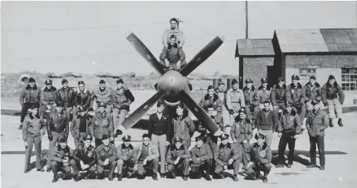  ??  ?? When the war ended, the squadron was based at Shanghai. It was the final base they were listed to before returning to the States. This photo includes all the officers in the squadron. (Photo courtesy Reed collection)