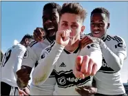  ??  ?? MAJOR TOM: Cairney celebrates his opener against a dismal Everton at Craven Cottage yesterday