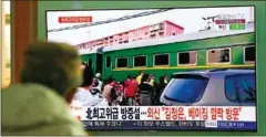  ?? JUNG YEON-JE/AFP ?? A man watches a news report about a suspected visit to China by North Korean leader Kim Jong-un, in Seoul, on Tuesday.