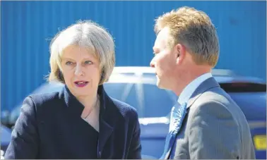  ??  ?? Theresa May with Craig Mackinlay