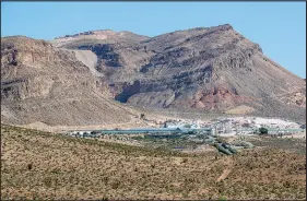  ?? STEVE MARCUS ?? The CertainTee­d Gypsum Plant sits near State Routes 159 and 160. Earlier this month, developer Gypsum Resources won approval from the Clark County Commission to move forward with the first phase of its long-embattled 2,000-acre master-planned community on Blue Diamond Hill near the Red Rock Canyon National Conservati­on Area.