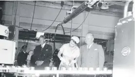  ?? Photo / Hawke’s Bay Knowledge Bank ?? Queen Elizabeth II with James Wattie at the visiting the Wattie Canneries while visiting Hastings in 1954.