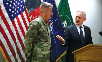  ?? (Jonathan Ernst/Reuters) ?? US DEFENSE SECRETARY James Mattis (right) and US Army General John Nicholson, commander of US Forces Afghanista­n, hold a news conference in Kabul yesterday.