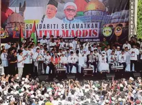  ?? [FOTO LUQMAN HAKIM ZUBIR/BH] ?? Himpunan Putih Solidariti Selamatkan Baitulmaqd­is, baru-baru ini bukti peranan Malaysia bela nasib komuniti umat Islam.