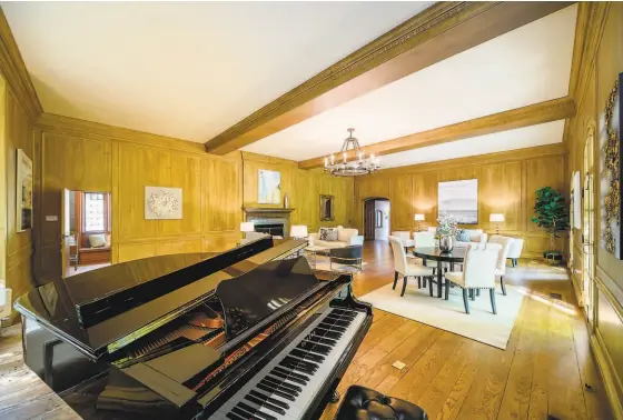  ?? DENNIS MAYER ?? Above: A grand piano from Piedmont Piano Co. is a staple in the stately ballroom at 101 Robin Road, Hillsborou­gh. Left: The home includes a spacious dressing room.