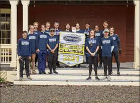  ?? Darl Zehr Photograph­y ?? Bethlehem grad Riley Grossman, center right, and Saratoga Springs grad Ezra Ruggles, center left, with their Geneseo cross country teammates.