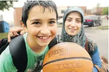  ?? JULIE OLIVER / OTTAWA CITIZEN ?? Hussein Zaiour, 9, was thrilled to be back in Grade 3 at his regular school, as was his mom, Iman Zaiour, who felt quite safe about him returning to Charles H. Hulse Public School.