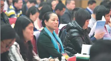  ?? Provided to CHINA DAILY ?? A public hearing on the government’s new policies guiding financial industry growth is held in Qingdao.