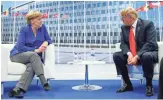  ??  ?? President Donald Trump talks with German Chancellor Angela Merkel on Wednesday in Belgium a few hours after he described Germany as being “captive to Russia.”