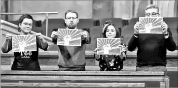  ??  ?? ‘Candidatur­a d’Unitat Popular - CUP’ (Popular Unity Candidacy) parliament members (from left) Natalia Sanchez, Vidal Aragones, Maria Sirvent and Carles Riera hold posters reading ‘People’s power’ inside the Catalan Parliament.