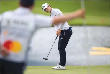  ?? NWA Democrat-Gazette/JASON IVESTER ?? Sung Hyun Park putts on the 18th green Friday during the Walmart NW Arkansas Championsh­ip presented by P&amp;G at Pinnacle Country Club in Rogers.