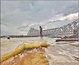  ?? PTI ?? Storm like weather near Howrah Bridge on Monday.