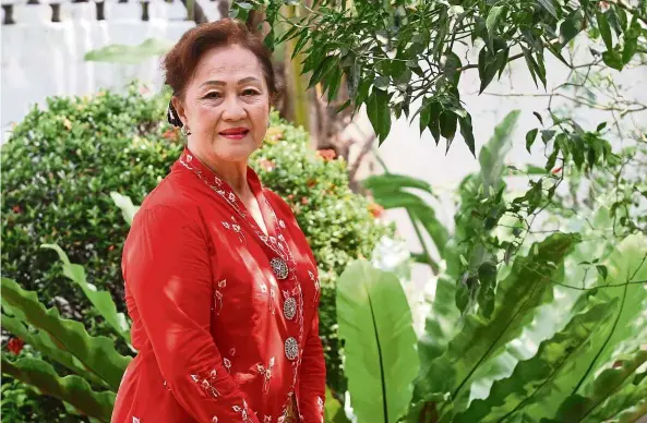  ?? — photos: Samuel Ong/the Star ?? rosita left Kampong China in terengganu when she was 19 but has nostalgic memories of her carefree years growing up there. Her book is the result of eight years’ worth of careful research and interviews with residents in the area.