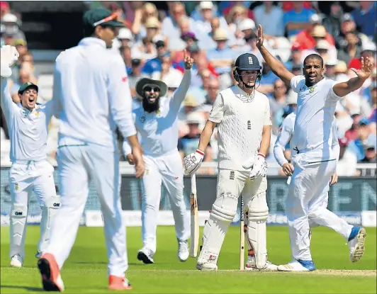  ?? Picture: AFP ?? ON FIRE: South Africa’s Vernon Philander, right, celebrates taking the wicket of England’s Gary Balance, in the second Test played at Trent Bridge in Nottingham this week