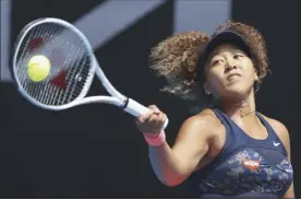 ?? AP photo ?? Naomi Osaka hits a forehand return to Hsieh Su-wei during their quarterfin­al match at the Australian Open today.