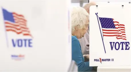  ?? STAFF PHOTOS BY DAN HENRY ?? Carolyn Park votes early at the Hamilton County Election Commission on Wednesday.