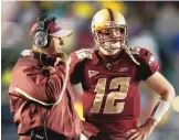  ?? AP FILE ?? Matt Ryan talks with Boston College coach Jeff Jagodzinsk­i in 2007. Ryan was 3-0 in bowl games with the Eagles.