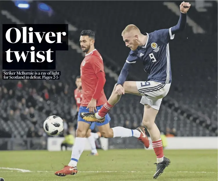  ??  ?? Scotland striker Oli Mcburnie fires a shot on goal during his national team debut at Hampden last night. Alex Mcleish’s first game of his second spell as manager ended in a 1-0 friendly defeat by Costa Rica.