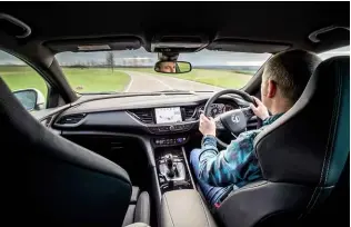  ??  ?? Left: GSI makes for a quiet and comfortabl­e cruiser. Far left: torque-vectoring four-wheel drive is shared with the Focus RS. Below left: 20-inch alloys save 1.5kg per corner; brakes are upgraded Brembos