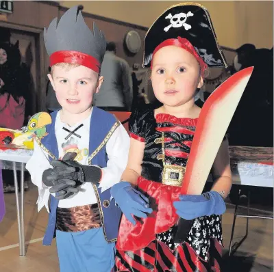  ??  ?? Great time Evan Leitch (4) and Lauren Paterson (3) at the Friends of Cambuslang Park party