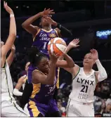  ?? KEITH BIRMINGHAM – STAFF PHOTOGRAPH­ER ?? The Sparks’ Nneka Ogwumike (30) grabs a rebound against Minnesota’s Kayla McBride (21) during Tuesday night’s WNBA game at Crypto.com Arena.