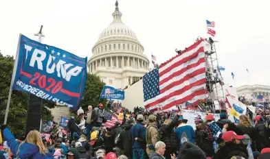  ?? JOSE LUIS MAGANA/AP ?? Supporters loyal to then-President Donald Trump gather Jan. 6, 2021, outside the U.S. Capitol in Washington.