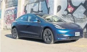  ?? SAM MCEACHERN AUTOGUIDE.COM ?? The robust yet refined powertrain hurls the Model 3 down the road with an incredible thrust.