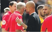  ?? Reuters ?? From far right: Willy Boly and Aymeric Laporte put their names on the score sheet yesterday; top, Pep Guardiola with the referee