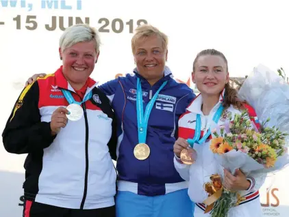  ??  ?? (L-R) Germany’s Katrin Quooss, who won Silver, Gold medallist Satu Makela-Nummela from Finland and Ektarina Rabaya from Russia who won the Bronze medal after the Trap Women Final at the ISSF World Cup Shotgun 2018 in Malta. Photo: Domenic Aquilina