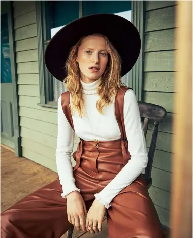  ??  ?? Left DUNGAREES, £380, Nanushka. JUMPER, £155, Kate Spade New York. HAT, from £139, Jessie Western. EARRINGS, £80, Joanna Cave. NECKLACE, £150, Rachel Jackson, from Wolf & Badger. RINGS, from left, £1,200, Joanna Cave, and £39, Daisy London