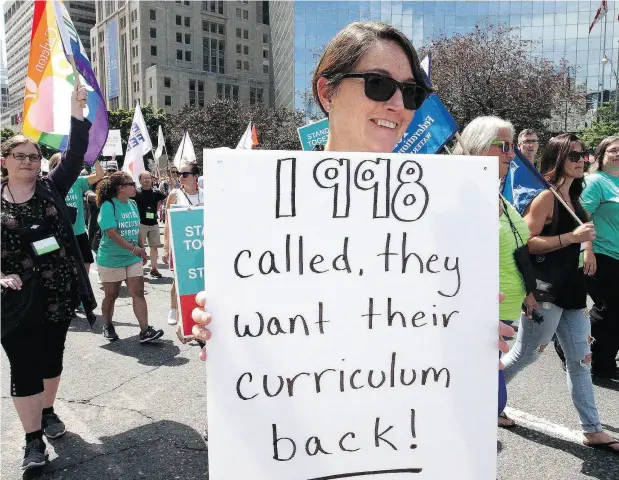  ?? STAN BEHAL / POSTMEDIA NEWS FILES ?? Ontario elementary teachers’ supporters protest the Ford government’s sex-ed rollback in August at the legislatur­e in Toronto.