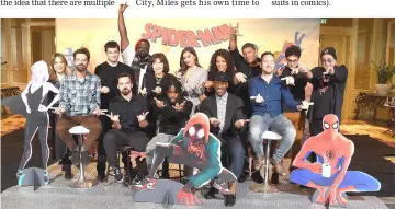  ??  ?? Jake Johnson, Shameik Moore, Mahershala Ali, Luna Lauren Velez, Hailee Steinfeld, Brian Tyree Henry, Lily Tomlin and film makers attend the photocall for ‘Spider-Man: Into The Spider-Verse’ recently in Los Angeles, California. — AFP file photo