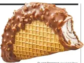  ?? Claire Grummon Associated Press ?? THE CHOCO TACO is a mishmash, and nothing’s more authentica­lly Mexican than that.