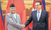  ?? REUTERS ?? Nepal's KP Sharma Oli with China’s Li Keqiang.