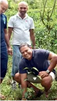  ??  ?? Managing Director Sarinda Unamboowe ceremoniou­sly planting the first of over 1,000 rainforest trees