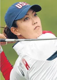  ?? Pictures: Getty/AP. ?? Far left: Catriona Matthew on the 12th tee during practice yesterday, while Europe team-mate Georgia Hall, centre, enjoys a laugh on the 18th green; American star Michelle Wie, above, tees off on the second.