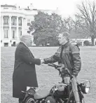  ?? NICHOLAS KAMM/AFP/GETTY IMAGES ?? Harley-Davidson CEO Matthew Levatich and President Donald Trump at the White House last year.